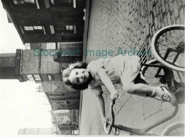 Girl on a tricycle, Marsland Street, Portwood                                                                                                                                                                                                                  